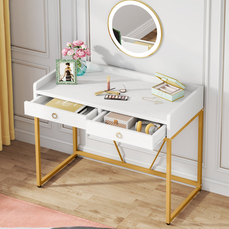 Gold and white desk deals with drawers